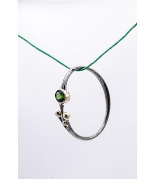 Bracciale, 2026 | oro, argento e tormalina verde