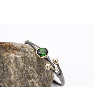 Bracciale, 2026 | oro, argento e tormalina verde