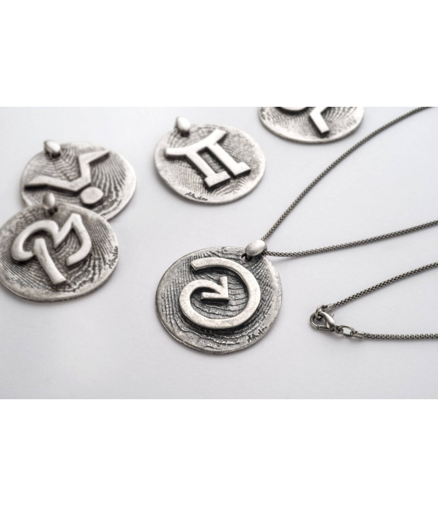 Zodiac sign pendant